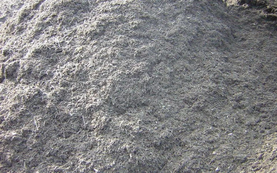 Close-up van donkere compost